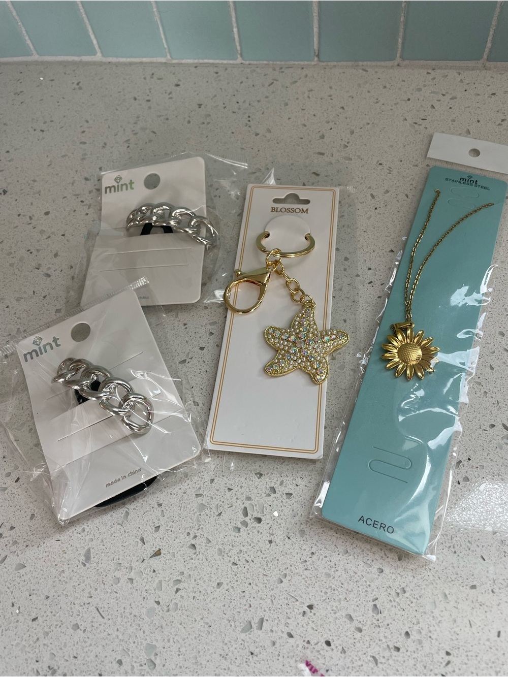Gold Starfish Keychain with Sparkling Crystals with hair ties and sun necklace